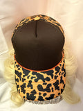 Black & Orange Cow Print Mesh Snapback Trucker Hat