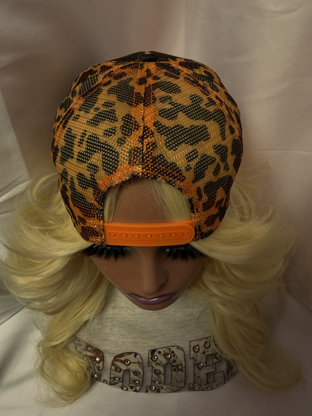 Black & Orange Cow Print Mesh Snapback Trucker Hat
