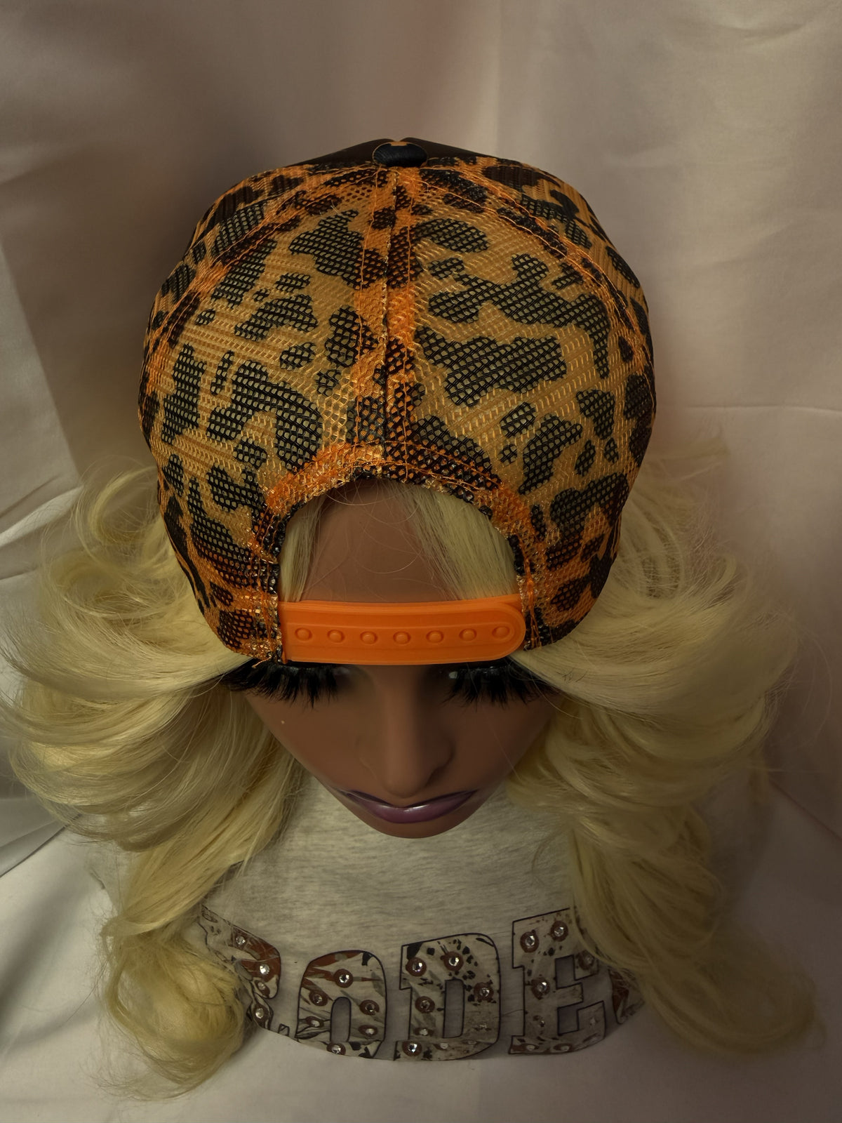 Black & Orange Cow Print Mesh Snapback Trucker Hat